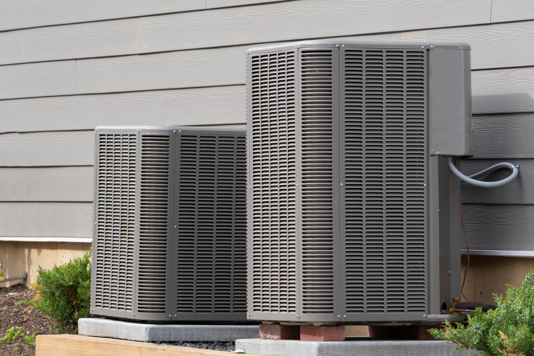 Cooling Services – Gas pack units installed on the exterior of a home in Columbus, GA | DEV Energy Savers Cooling Services - Gas pack units installed on the exterior of a home in Columbus, GA